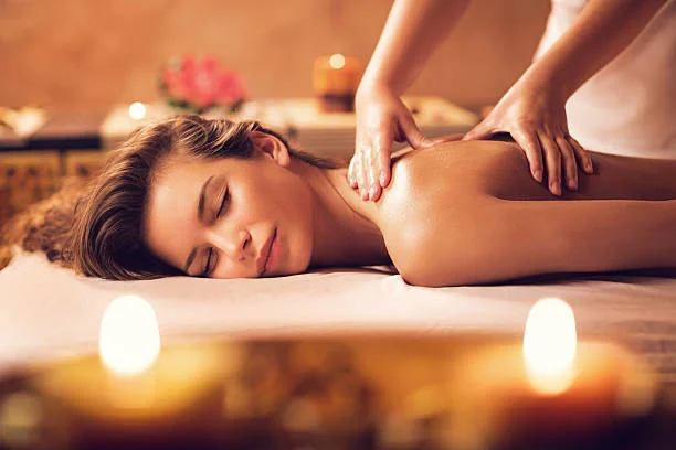 Relaxing back massage, by candlelight